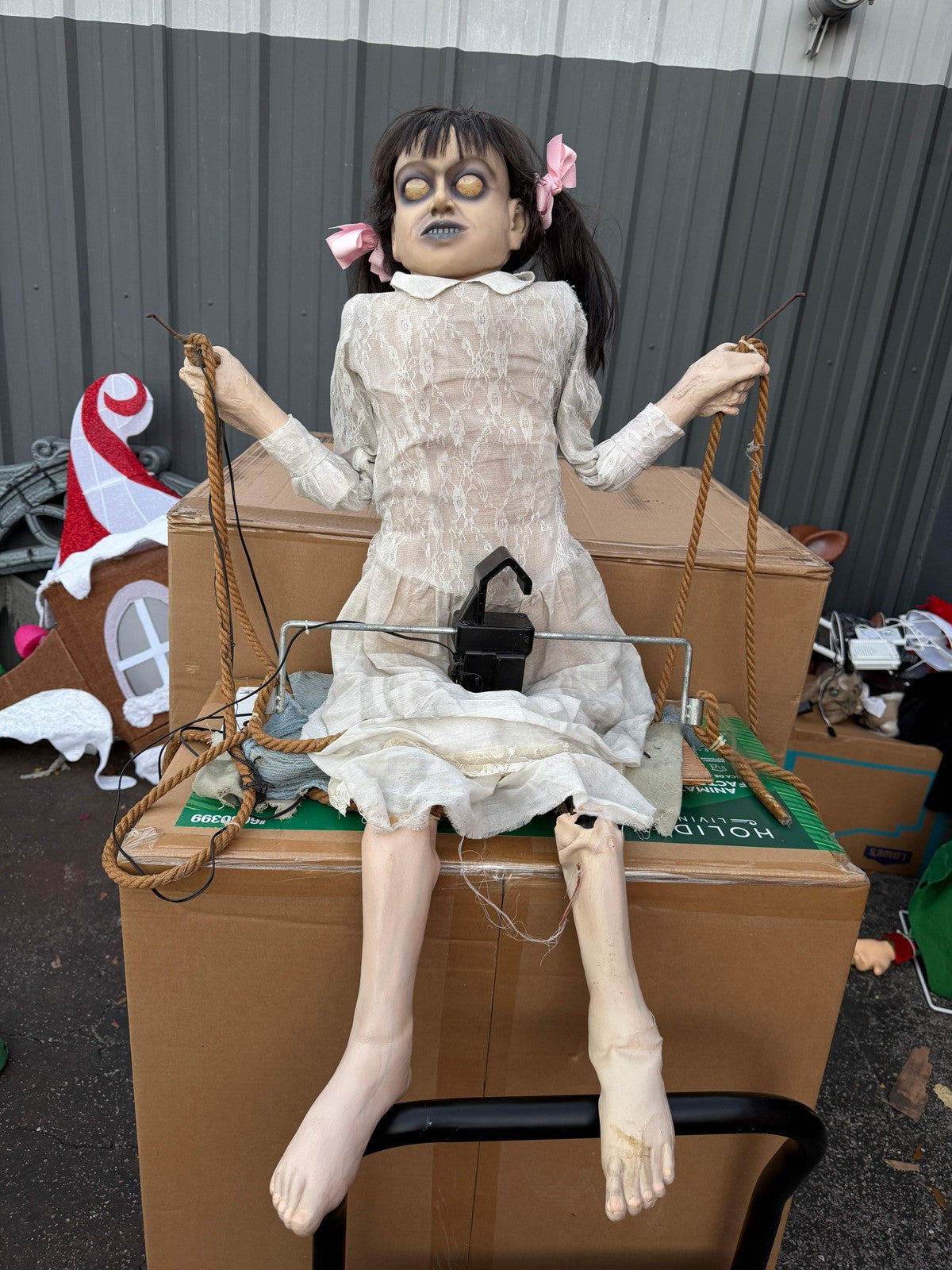 Spirit Halloween Animated Animatronic Life Size Zombie Swing Girl Prop
