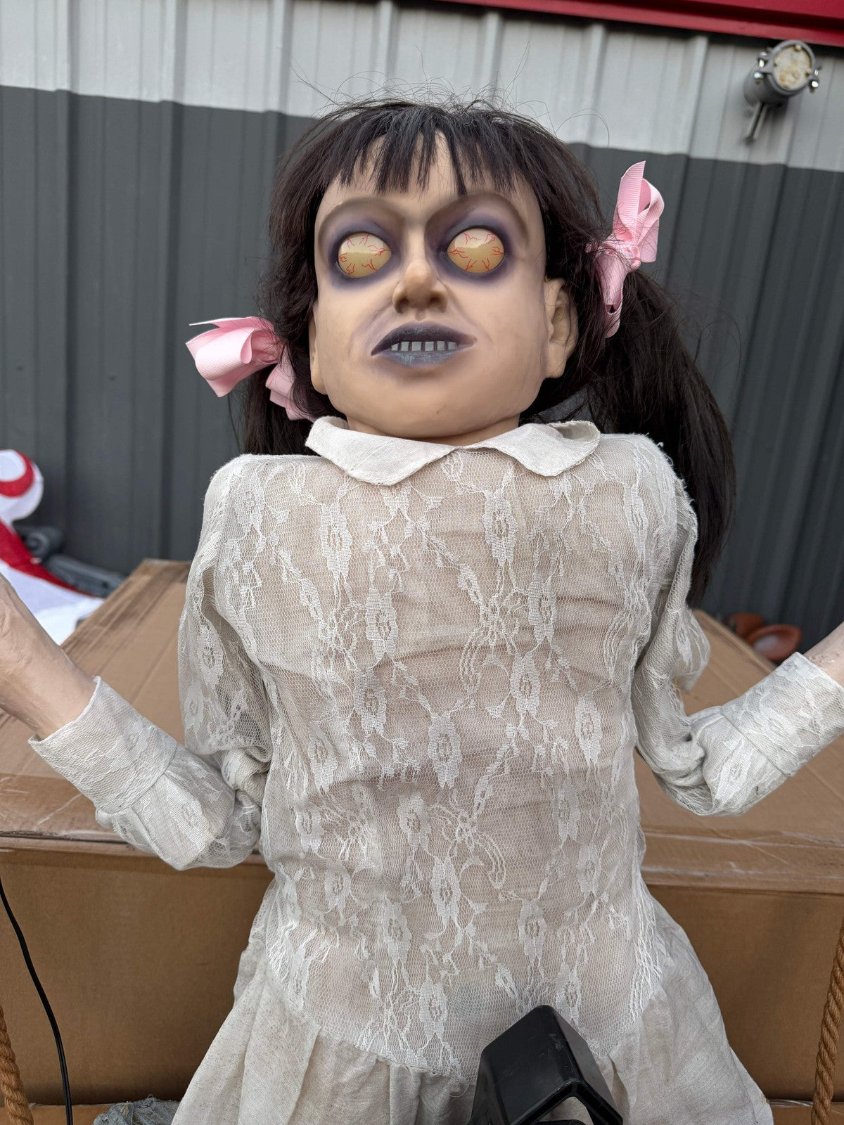 Spirit Halloween Animated Animatronic Life Size Zombie Swing Girl Prop